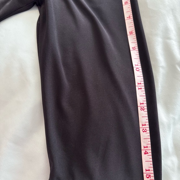 High/low black top with black and pink patterned skirt attached. - Picture 6 of 9